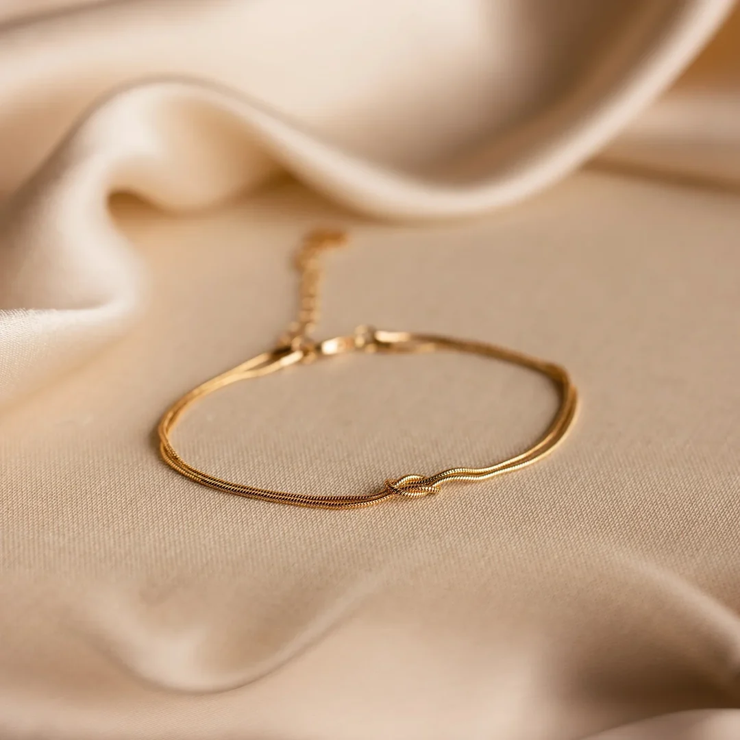 BS14709-G_Main Linked by Love Knot Bracelet - Gold - Image 1